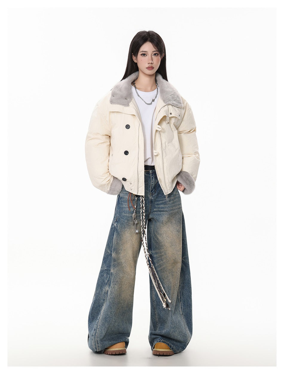 Full-length front view of an ivory cropped jacket with a gray faux-fur collar and cuffs, styled with wide-leg jeans.