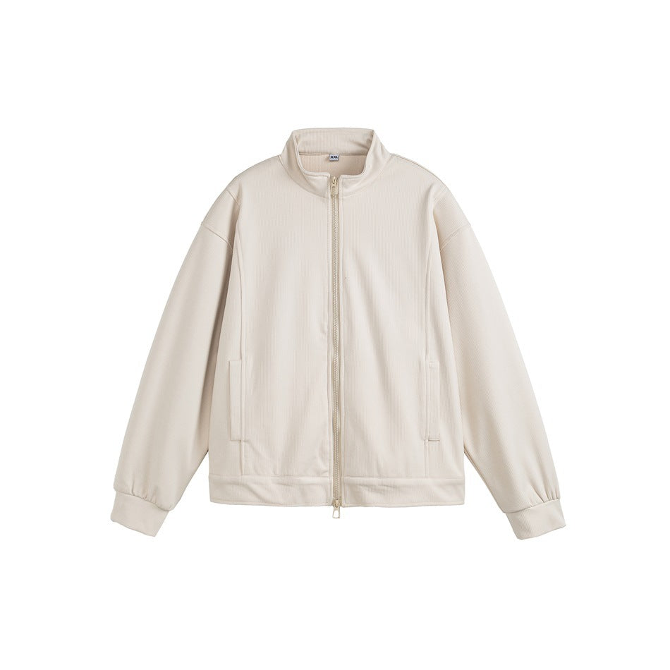 Beige stand-collar zip jacket flat lay with side pockets and ribbed cuffs