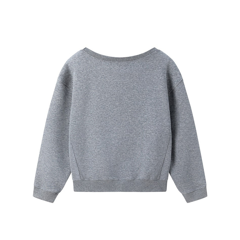 Back view of a plain heather-gray crewneck sweatshirt with long sleeves and ribbed cuffs and hem.
