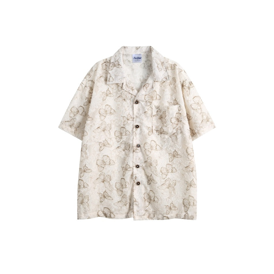 Apricot butterfly-print short-sleeve button-up shirt with collar and chest pocket, flat front view