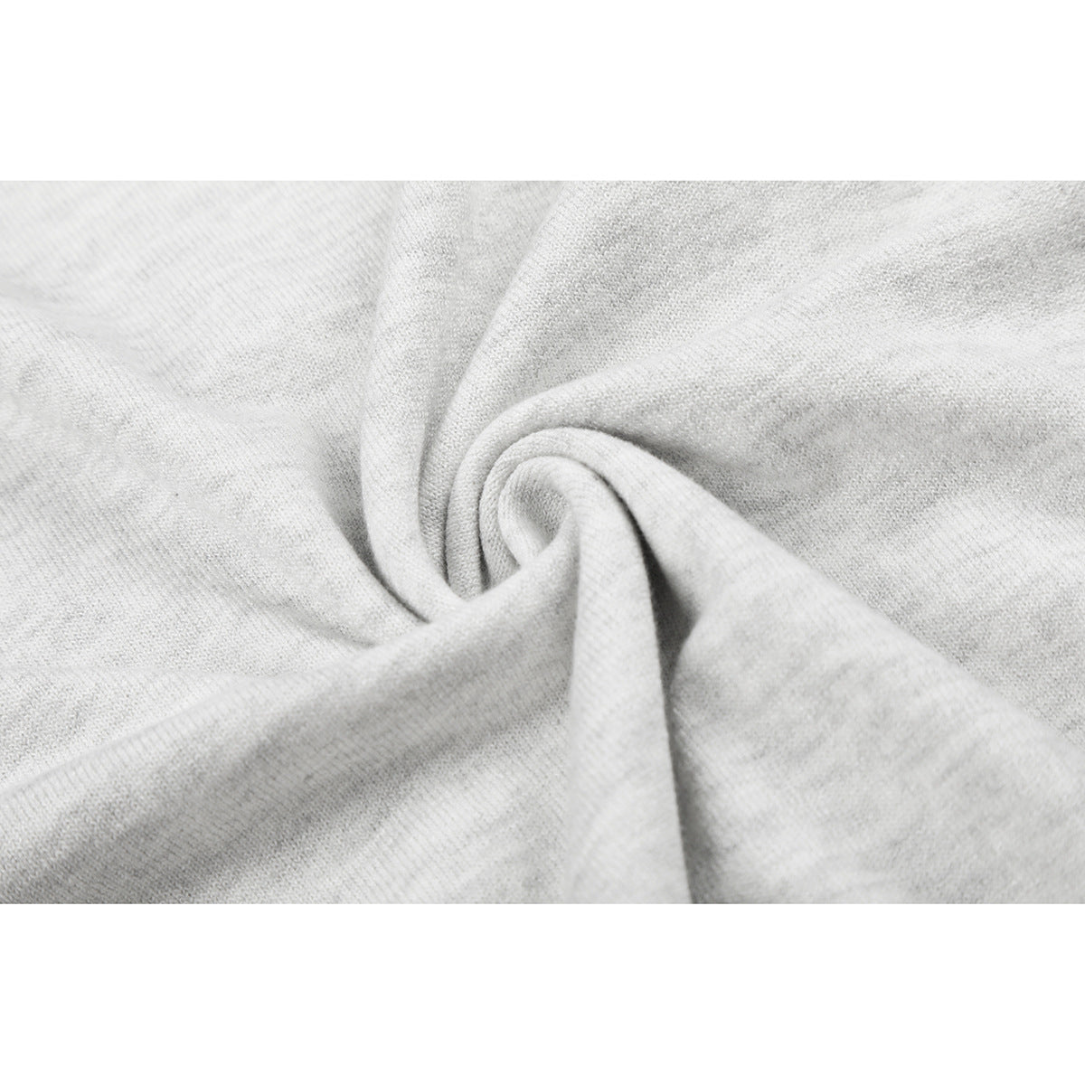 Close-up showing the light gray knit fabric gathered into soft folds.