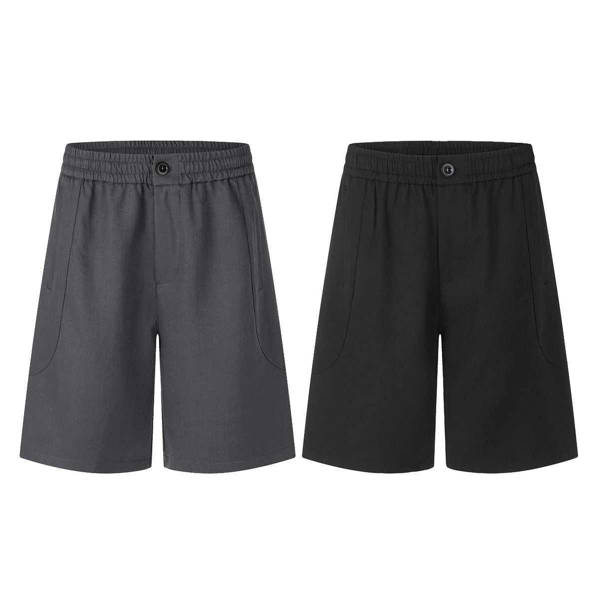 Two pairs of shorts shown from the front in charcoal gray and black, with elastic waists, buttons, and side pockets.