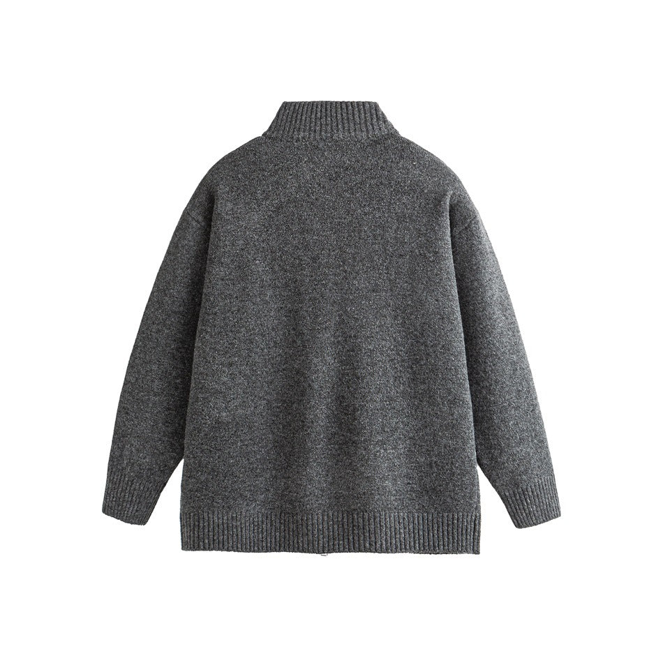 Back view of a charcoal gray high-neck sweater with ribbed collar, cuffs, and hem.