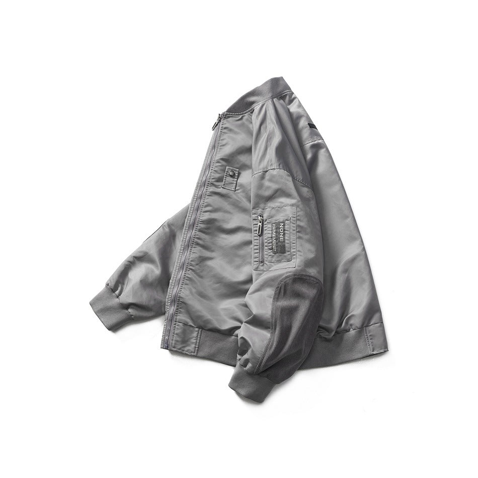 Gray zip-front jacket displayed against a white background, with ribbed cuffs and hem and a zippered sleeve pocket.