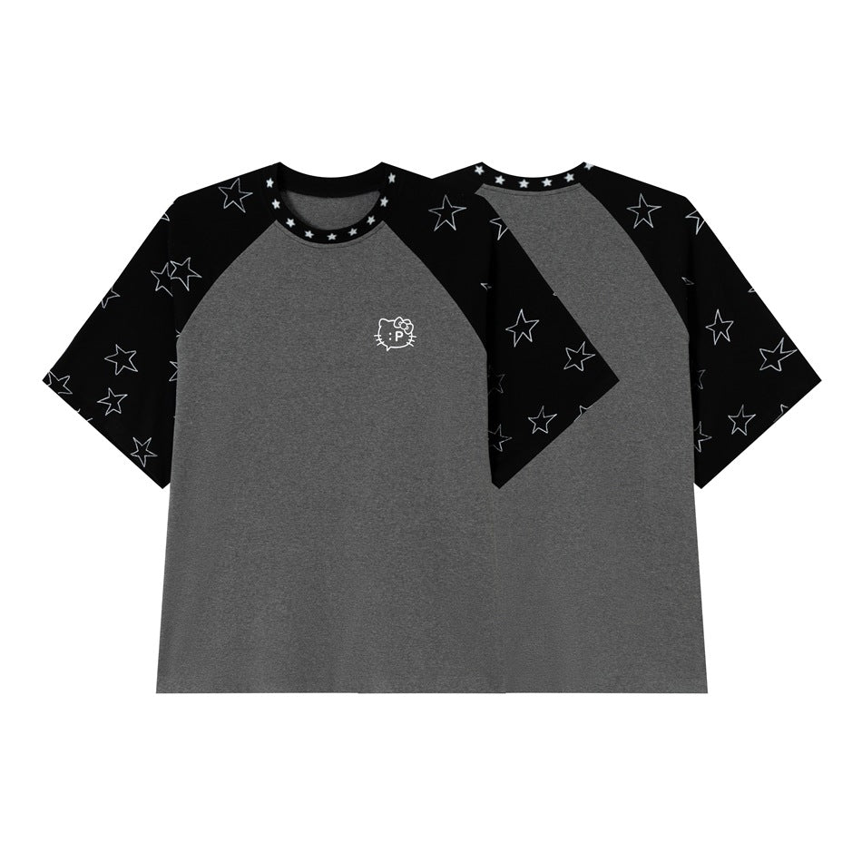 Gray raglan T-shirt with black star-print sleeves and a small cat-face graphic; front shown with the back behind it.