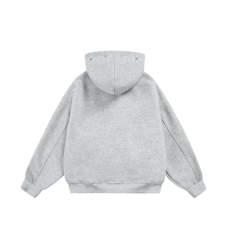 Back view of a light gray hoodie with a decorated hood, long sleeves, ribbed cuffs, and a ribbed hem.