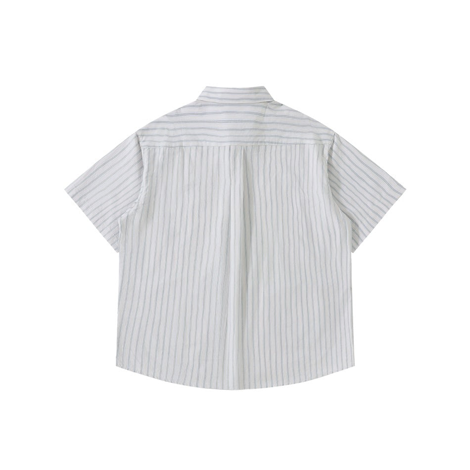 Back of gray-white striped short-sleeve shirt flat lay with horizontal-striped yoke and vertical-striped body