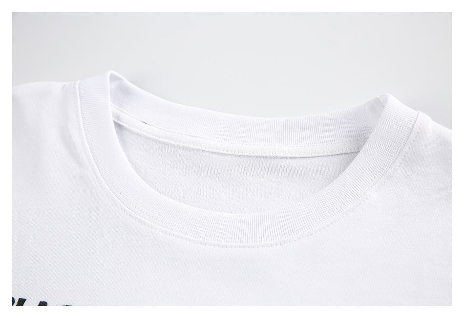 Close-up of the ribbed crew neckline and upper chest of a plain white T-shirt.