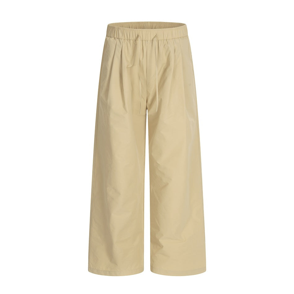 Khaki wide-leg pants with elastic drawstring waist and front pleats, front flat view