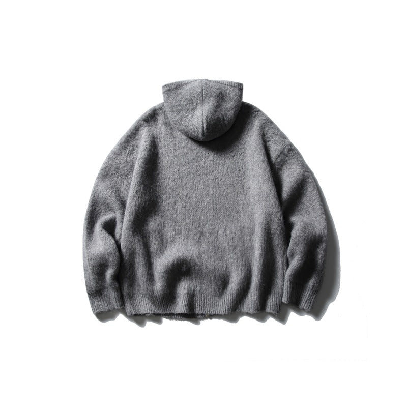 Back view of a gray hooded knit sweater laid flat against a white background.