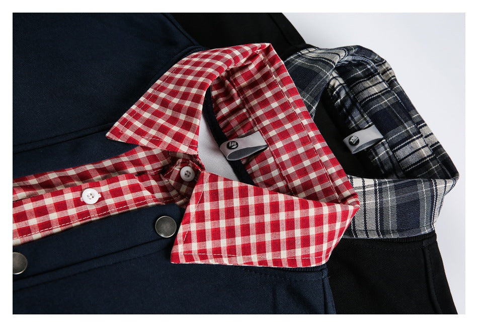 Close-up of jacket collars in red gingham and dark plaid, with snap fasteners visible.