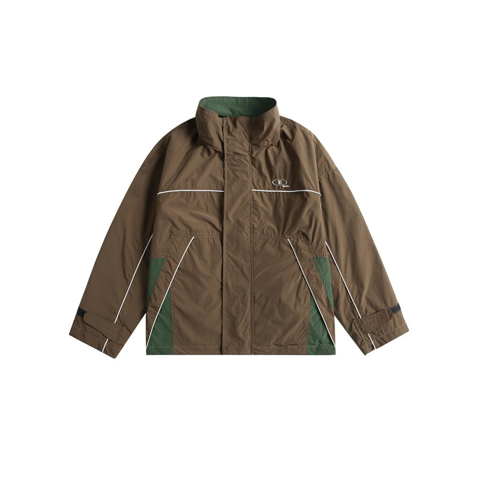Coffee brown stand-collar zip jacket with white piping and green side panels, flat lay front view