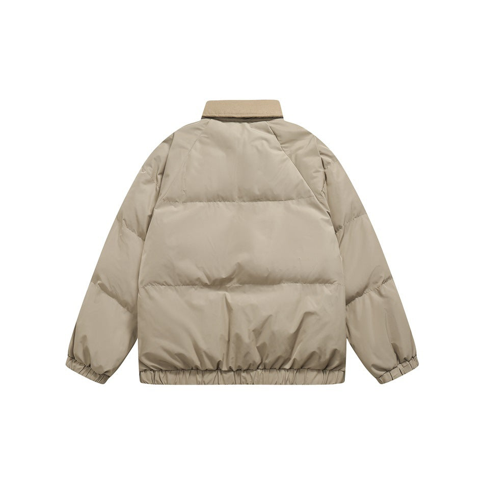 Back view of a light beige padded jacket with a matching collar, horizontal quilting, and elasticated cuffs and hem.