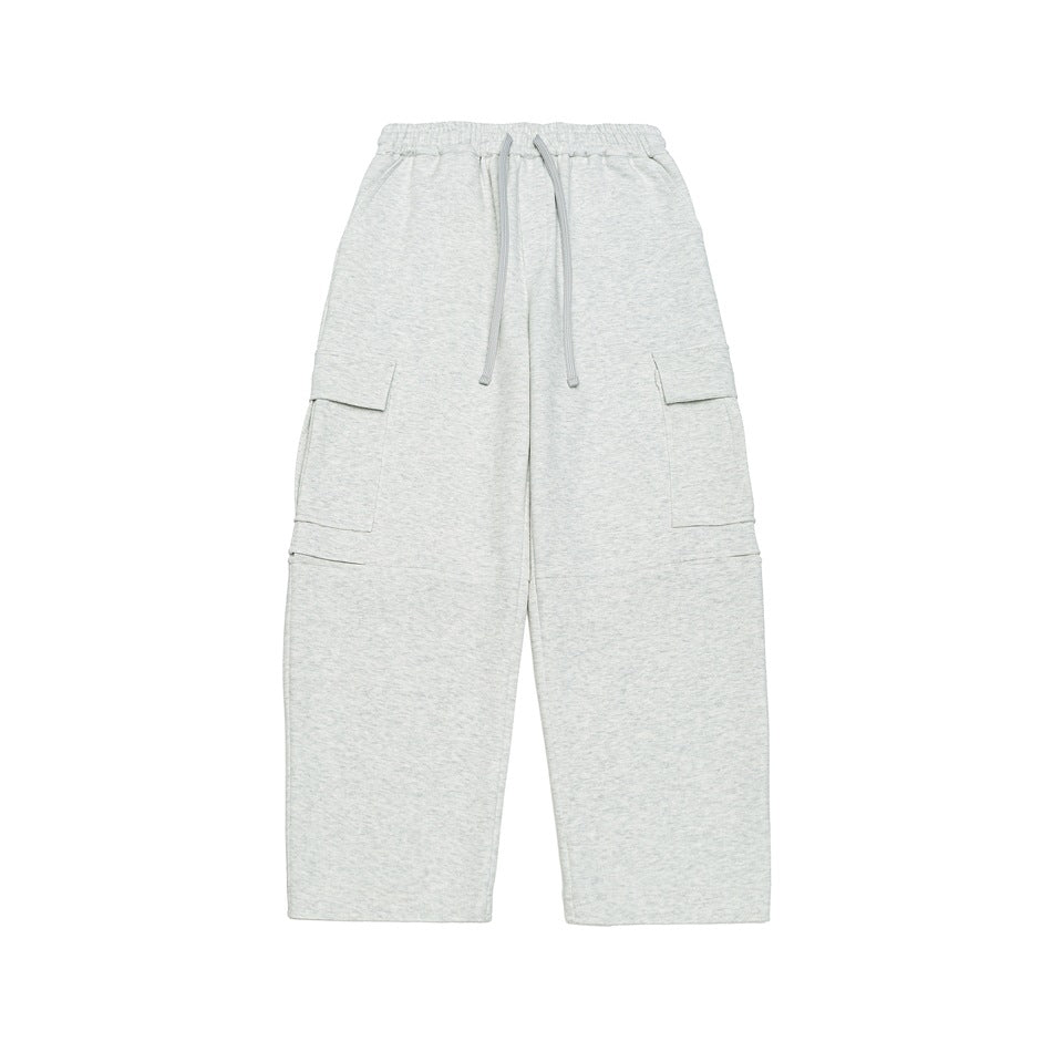 Heather gray wide-leg cargo sweatpants with drawstring waist and large side flap pockets, flat front view
