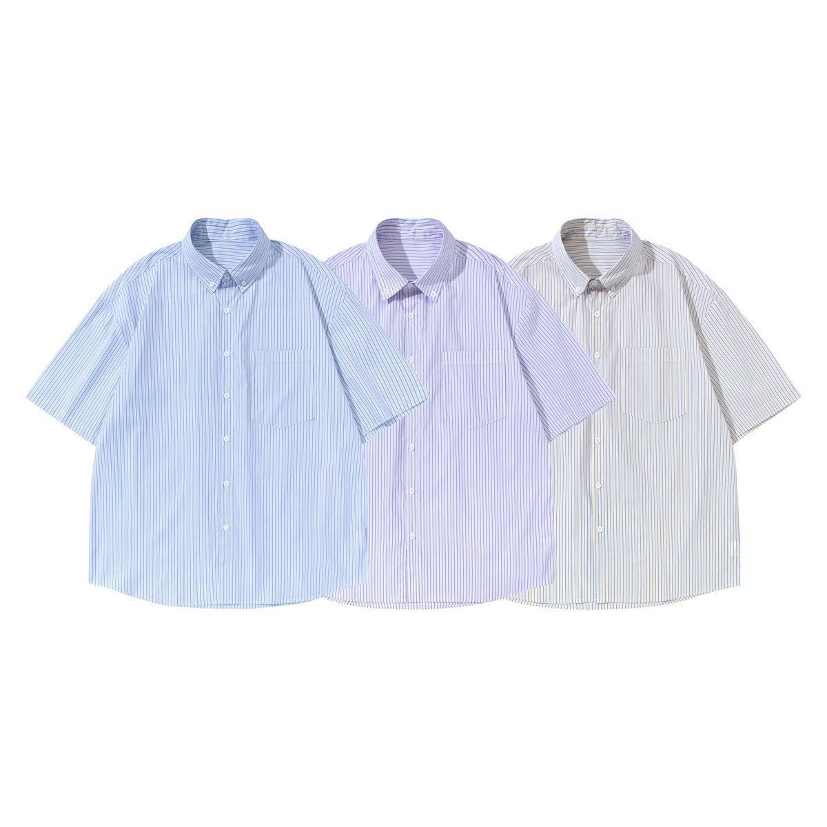 Three short-sleeve button-down shirts shown front-on in blue, lavender, and white with fine vertical stripes.