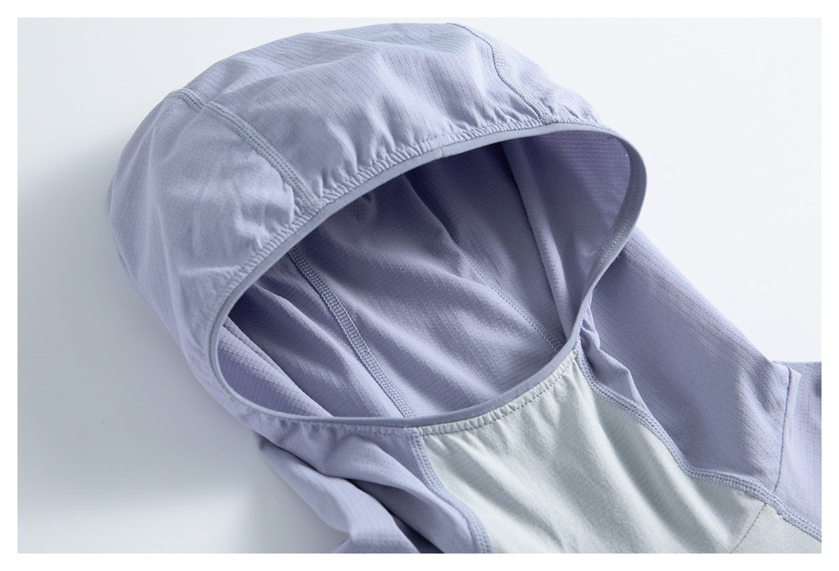 Close-up of the lavender hood interior, showing its lining, seams, and gathered edge.