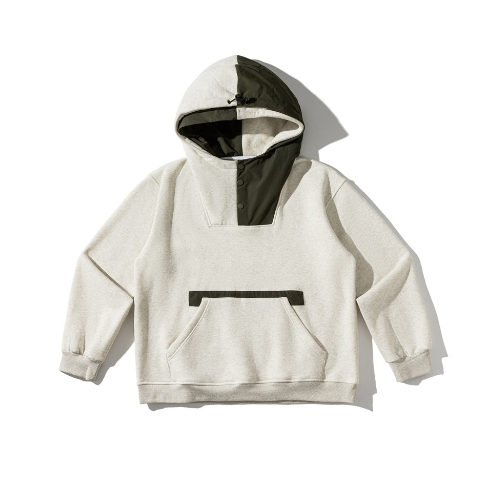 Oatmeal heather hooded sweatshirt with olive green color-block hood, snap placket and kangaroo pocket, flat lay