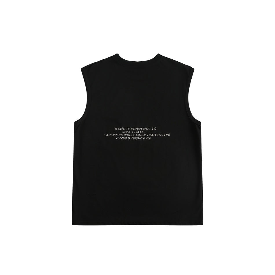Back of a black sleeveless top with a small centered white handwritten quote.