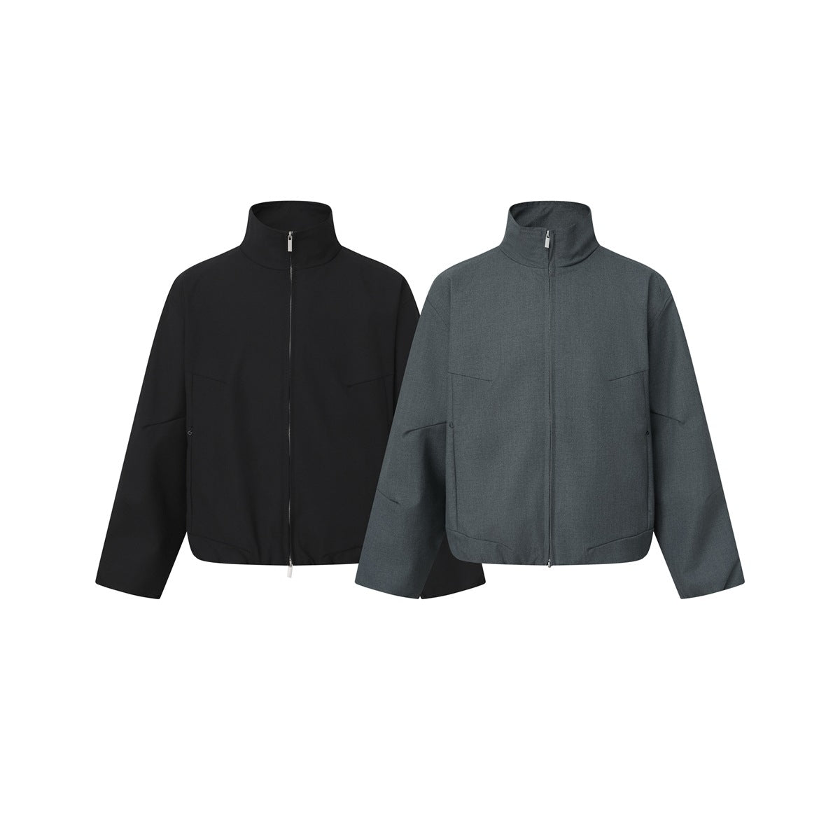 Two front views of a zip-front jacket with stand collars and long sleeves, shown in black and charcoal gray.
