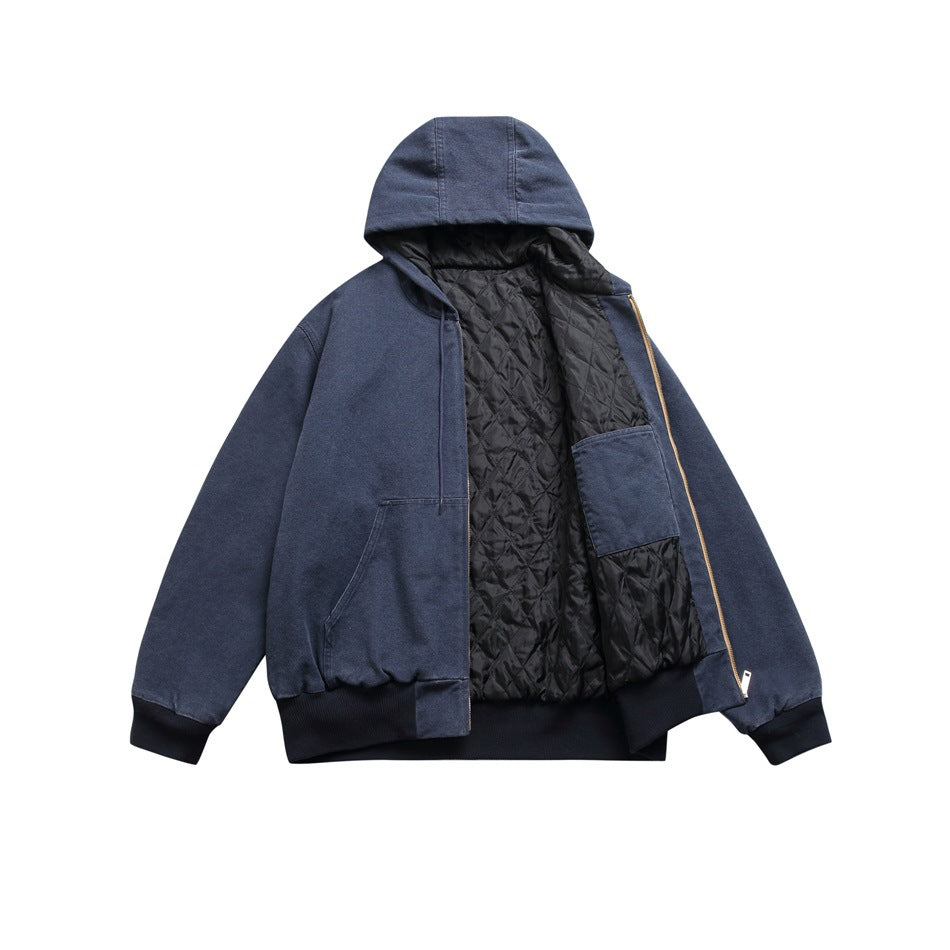 Front view of a navy hooded jacket opened to show its black diamond-quilted lining and zipper.