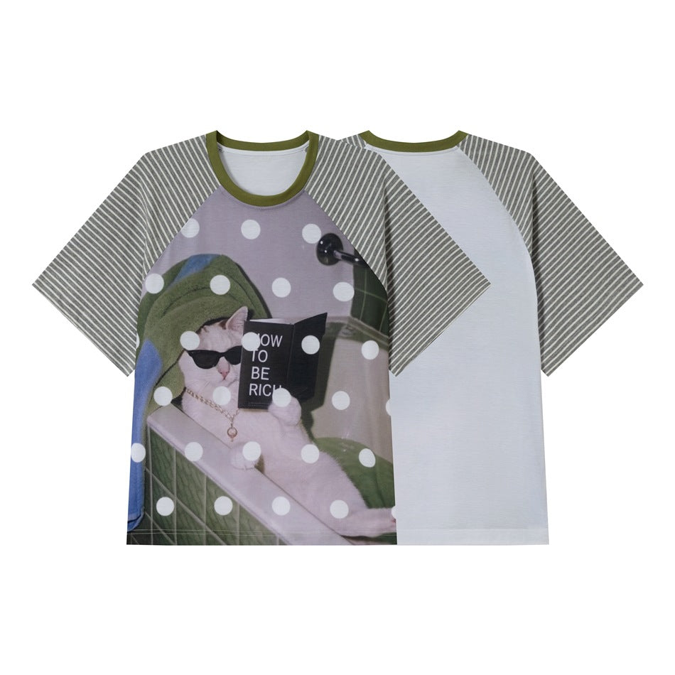 Front and back views of a short-sleeve shirt with gray striped raglan sleeves, an olive collar, and a cat graphic on the