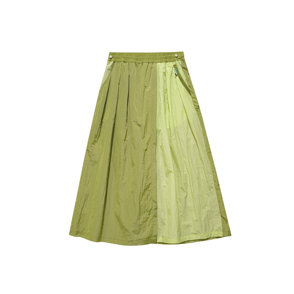 Olive and light green two-tone midi skirt flat lay with elastic waist, pleats and zip pocket