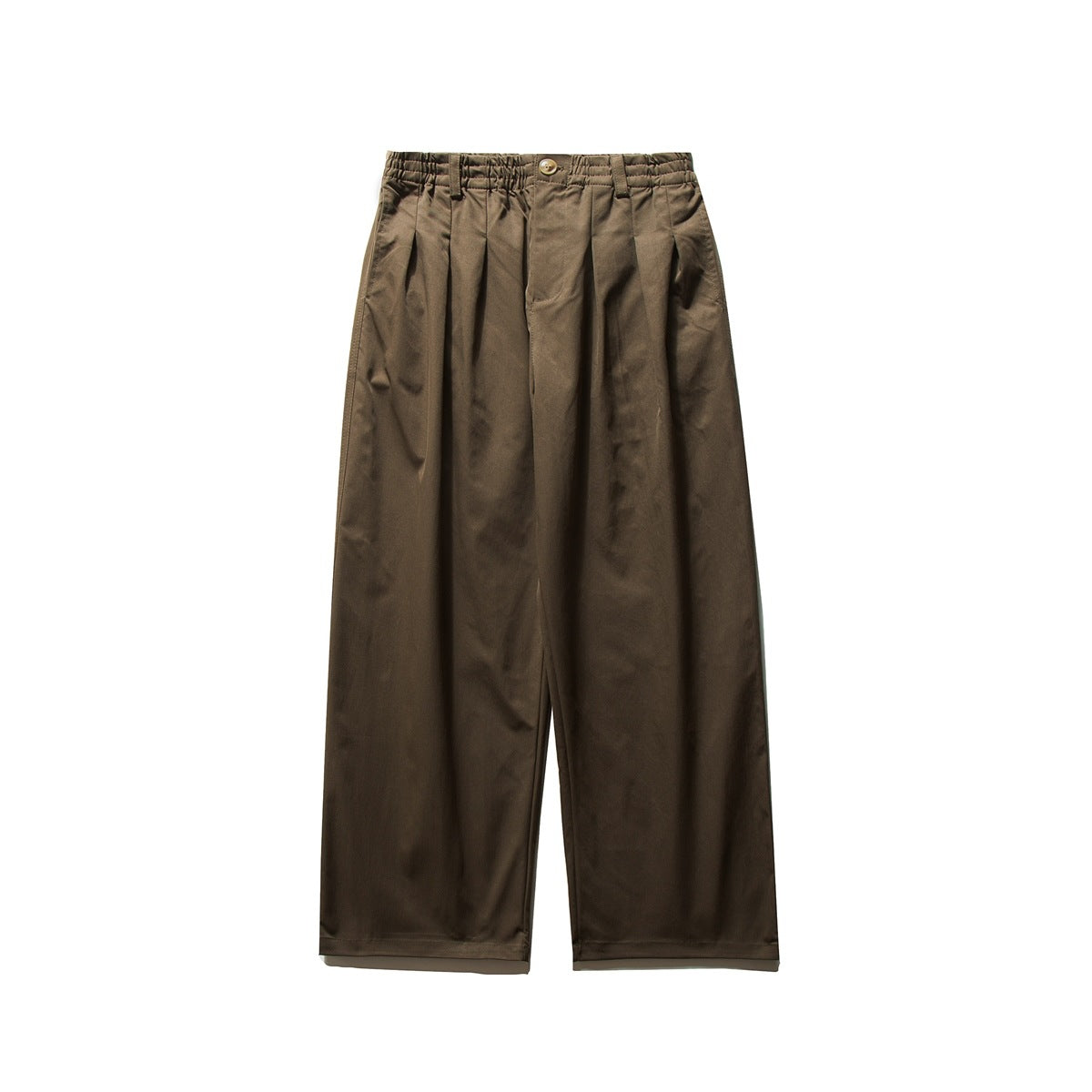 Brown wide-leg pleated trousers with elastic waistband and button closure, flat lay front view