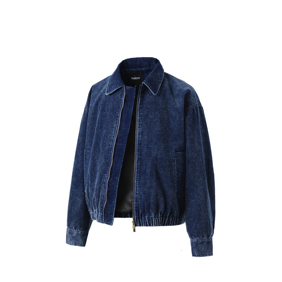 Navy blue corduroy jacket with the zipper partly open, showing the dark lining, angled front view