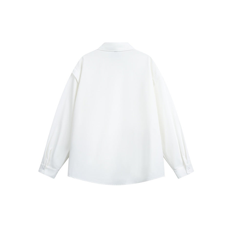 Back view of a white long-sleeve button-up shirt with a pointed collar and buttoned cuffs.