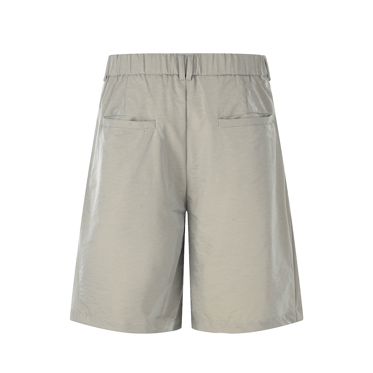 Rear view of light gray shorts with two welt pockets and a loop at the waistband.