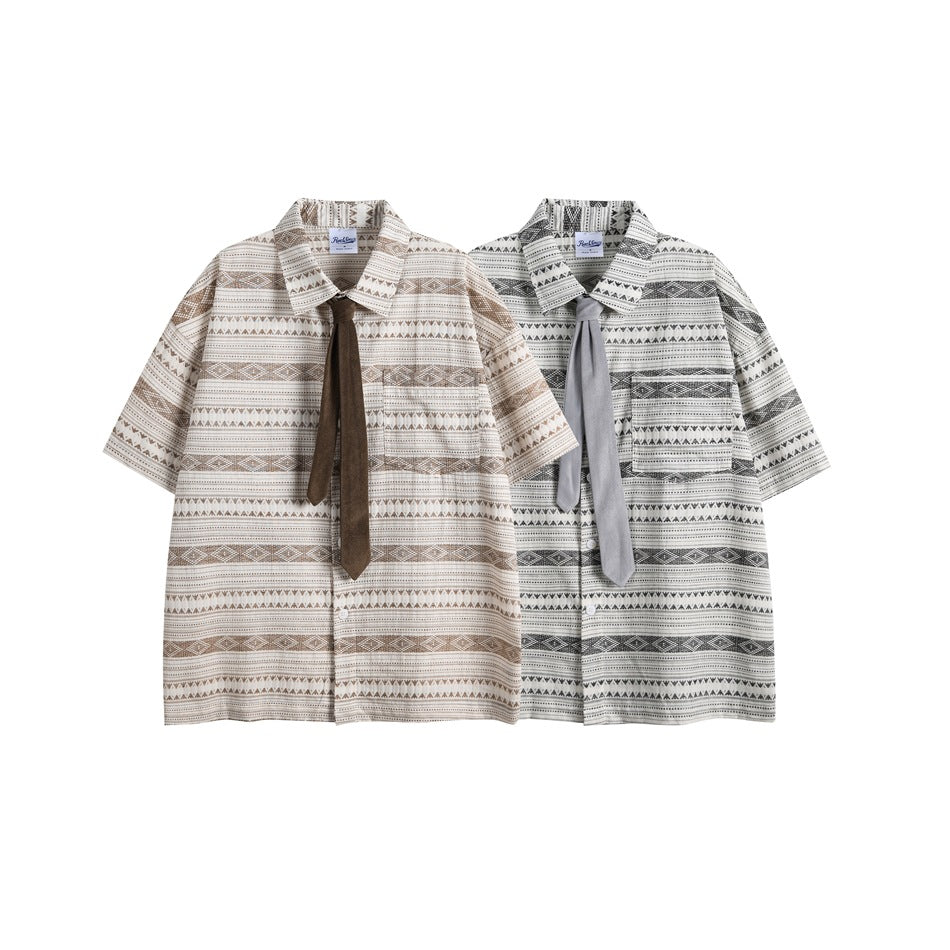 Two short-sleeve geometric button-up shirts shown together in taupe and black-and-white colorways, each with a tie.