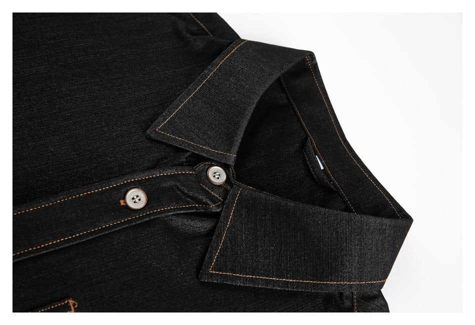 Close-up of a black denim shirt collar and button placket with silver buttons and tan stitching.