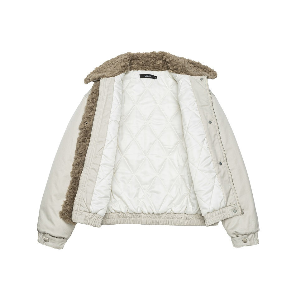 Pale beige jacket shown open from the front, with a quilted lining, plush taupe collar, zipper, and snap cuffs.