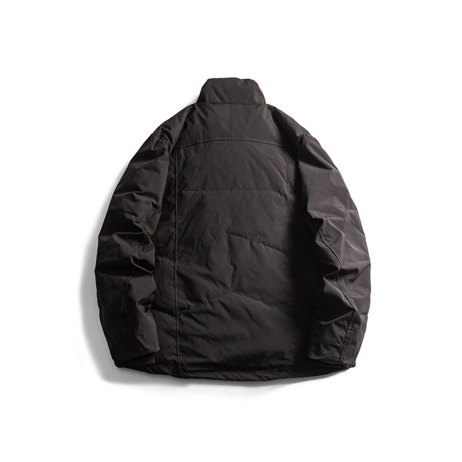 Back view of a black padded jacket with a raised collar and long sleeves.