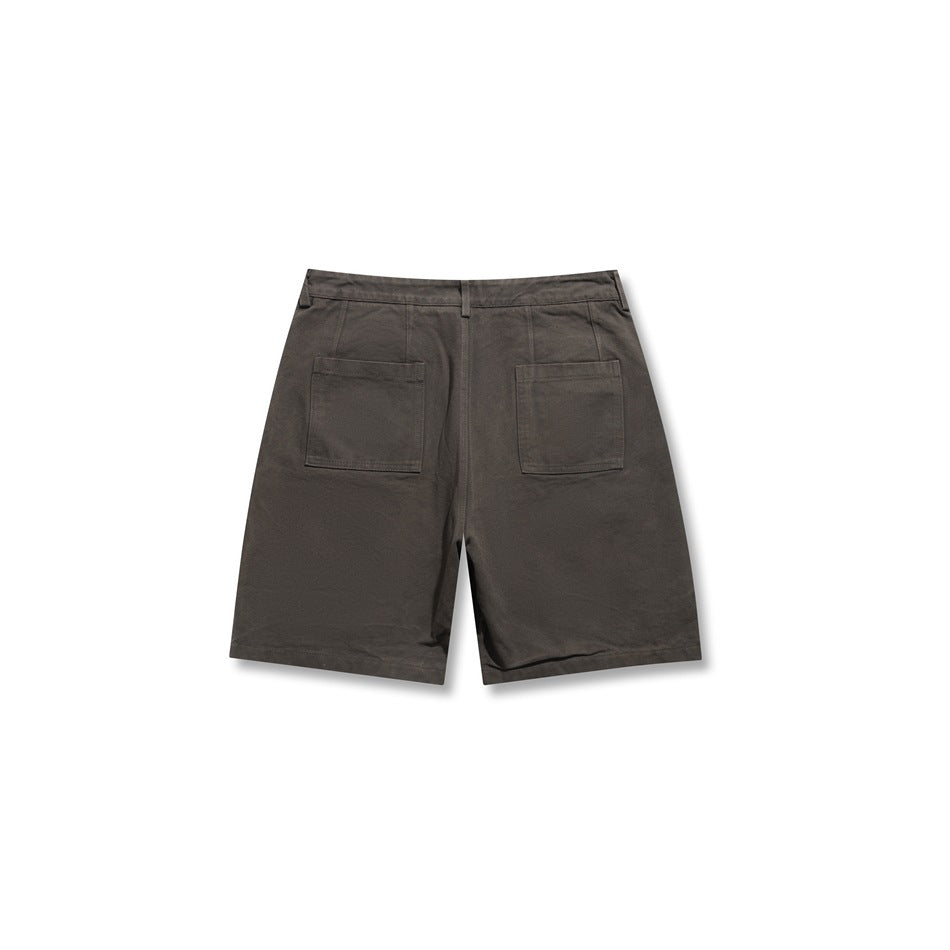 Gray-brown knee-length shorts, back view, with two patch pockets and a yoke seam at the waistband