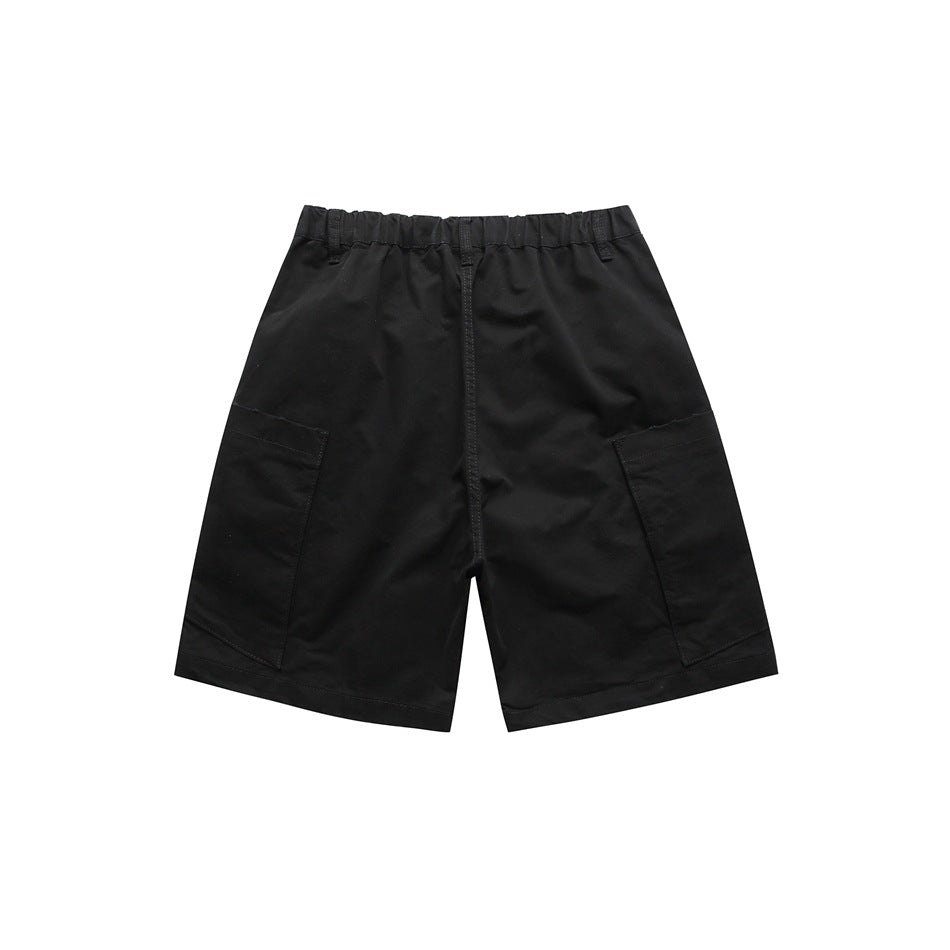 Back view of black shorts with elastic waistband section and large side cargo pockets