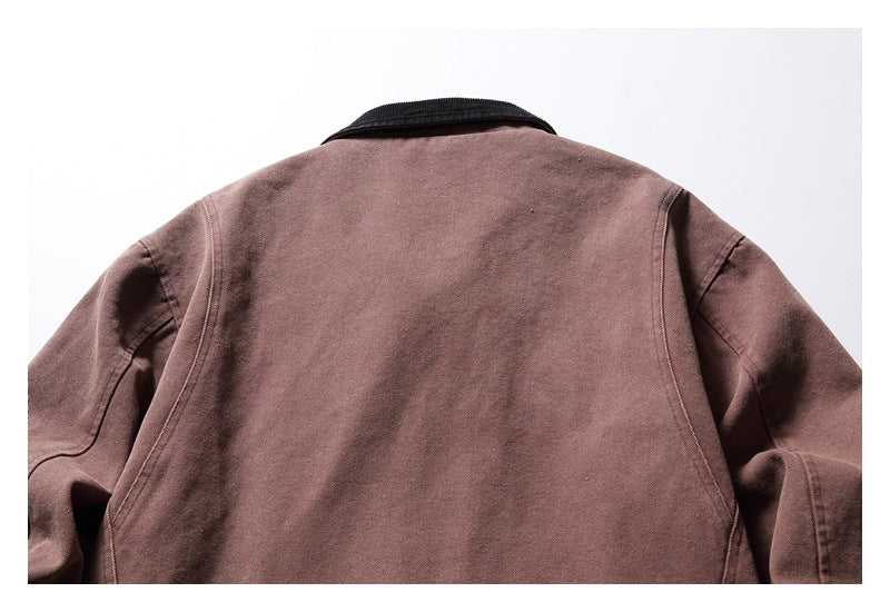 Upper back view of a mauve-brown jacket with a black collar and curved seam details.