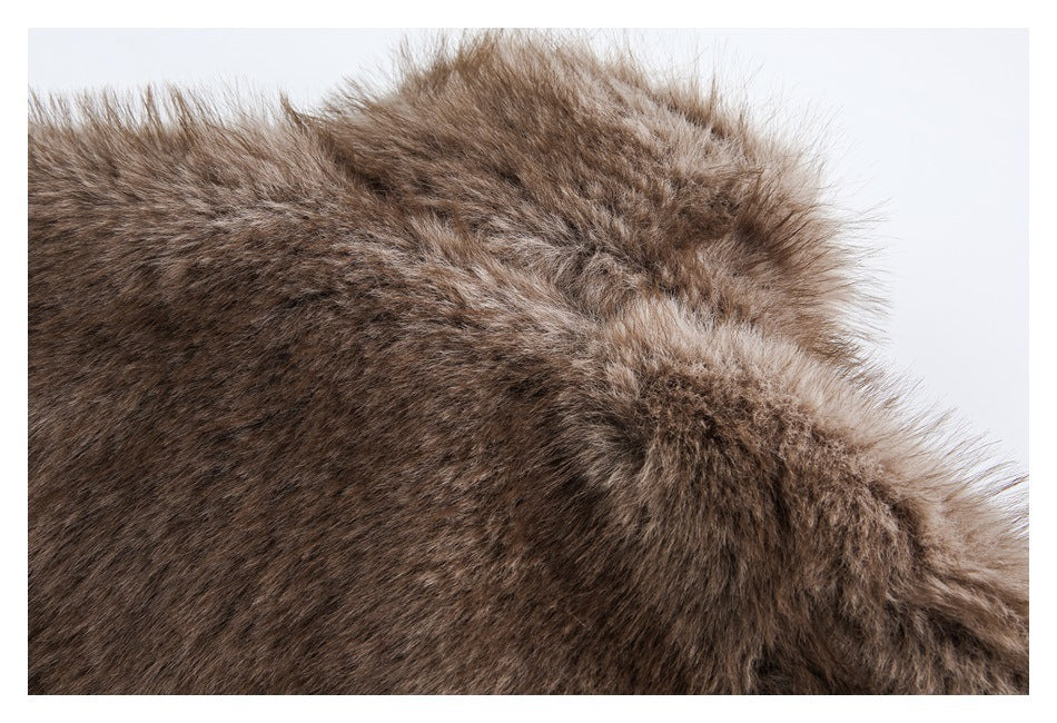Close-up of the long, mottled brown faux-fur pile on the garment.
