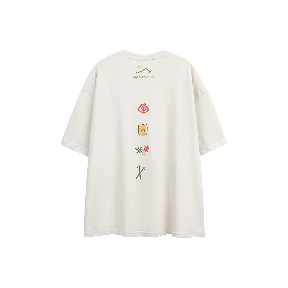 Back view of an off-white oversized T-shirt with a vertical row of small colorful graphics.