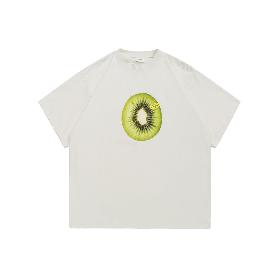 Apricot short-sleeve crew-neck T-shirt with a large green kiwi slice graphic on the chest, flat front view