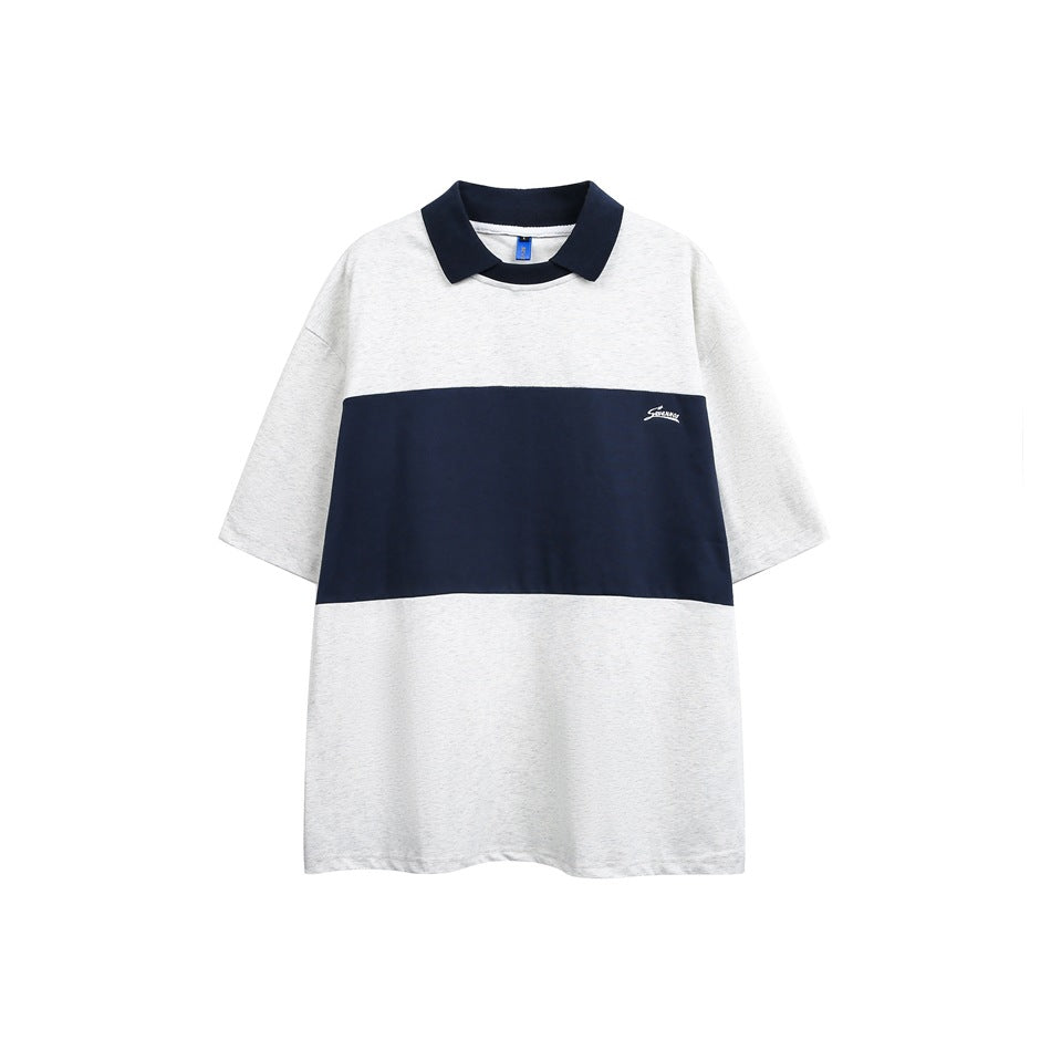 Light heather gray short-sleeve top with navy collar and wide navy chest panel, flat front view