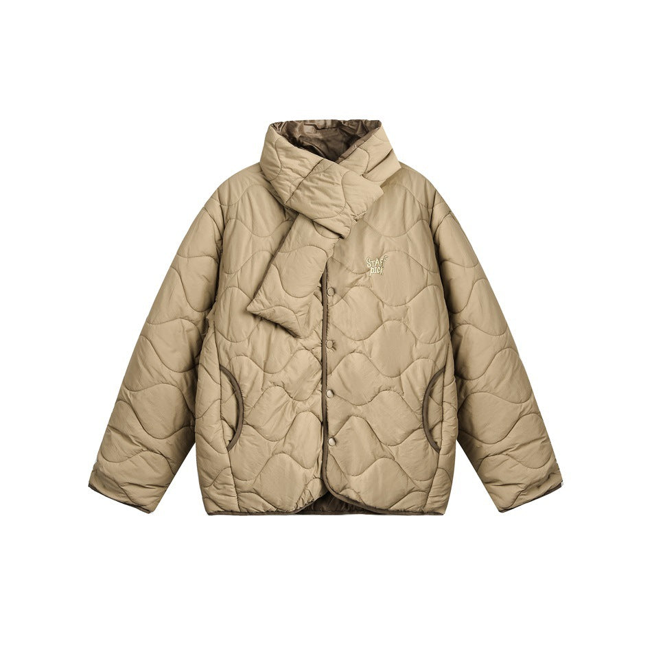 Khaki quilted jacket with wavy stitching, snap front, side pockets and a scarf-style neck piece, flat lay