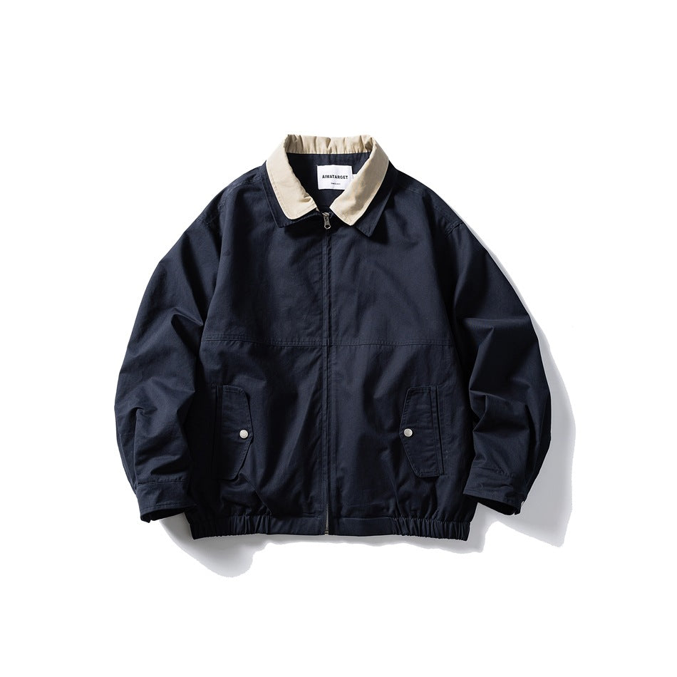 Navy zip-up Harrington jacket with beige collar, flap snap pockets and elastic hem, flat front view