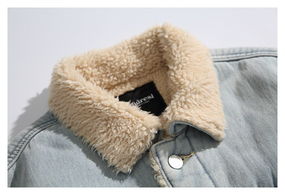 Close-up of the jacket's cream sherpa collar and a black neck label.