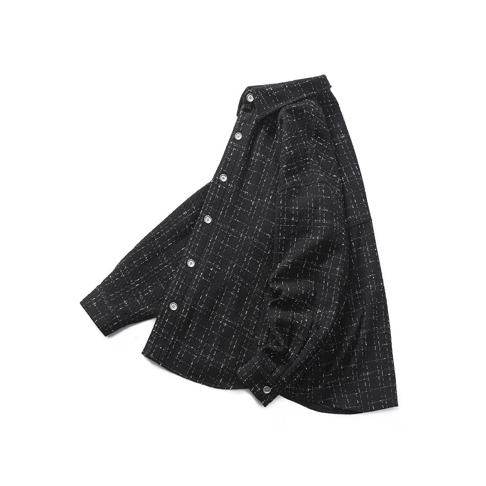 Black long-sleeved button-up shirt laid flat, with a white flecked grid pattern, pointed collar, and button cuffs.