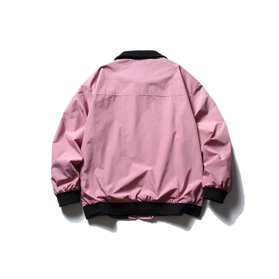 Back view of a pink jacket with a black collar, ribbed cuffs and hem.
