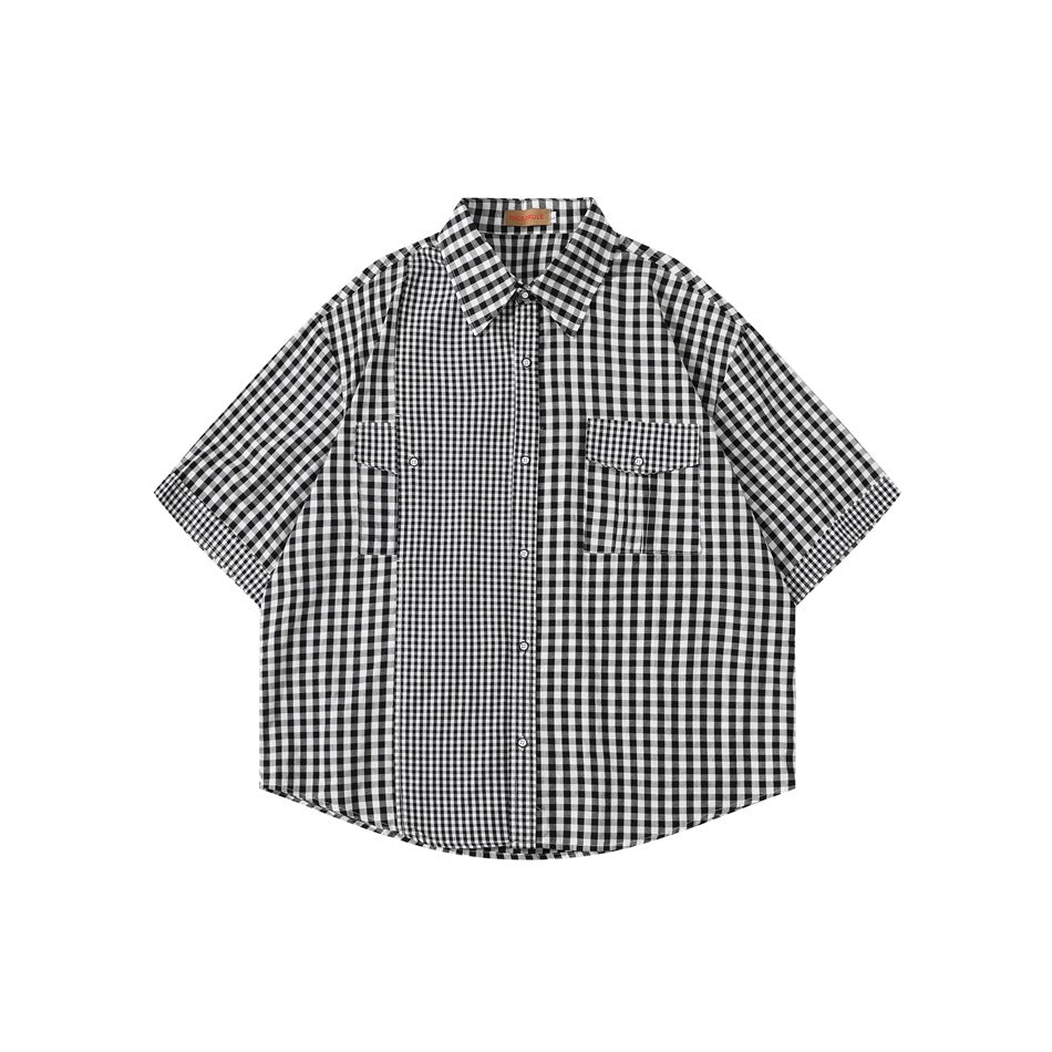 Black and white gingham short-sleeve shirt, front flat lay, with contrast check center panel and two flap chest pockets