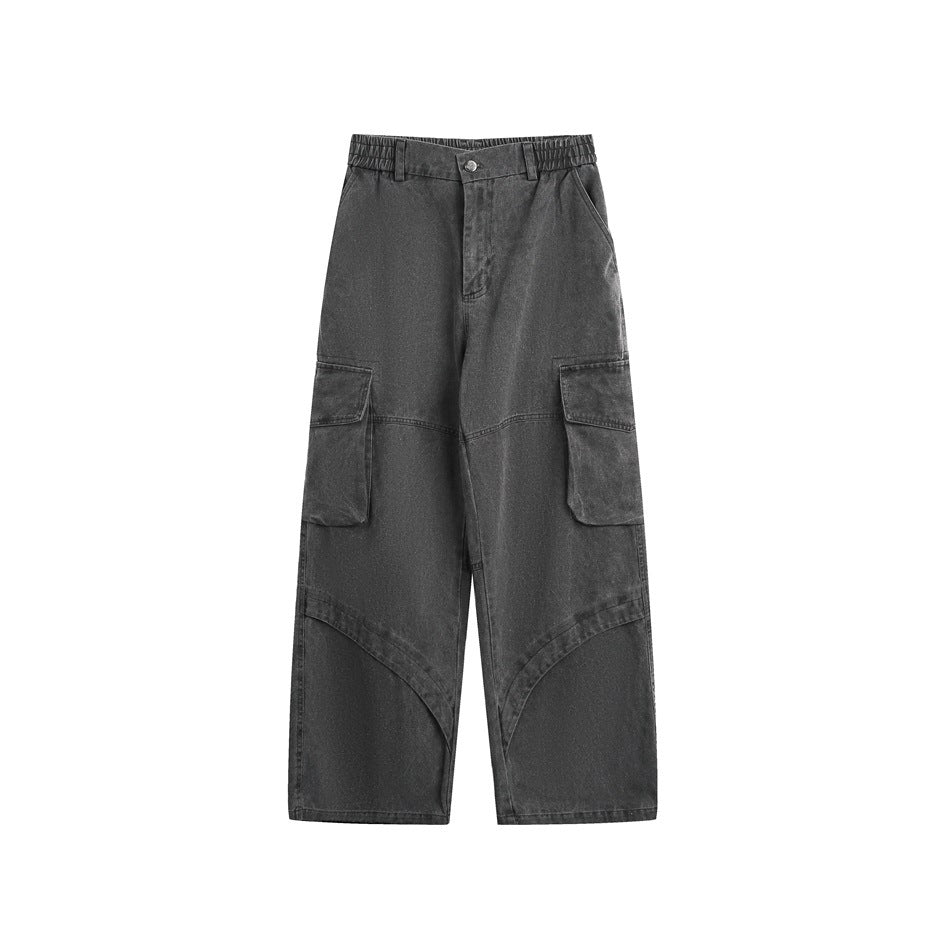 Black-gray washed wide-leg cargo pants, front view, with flap side pockets and curved lower-leg seams