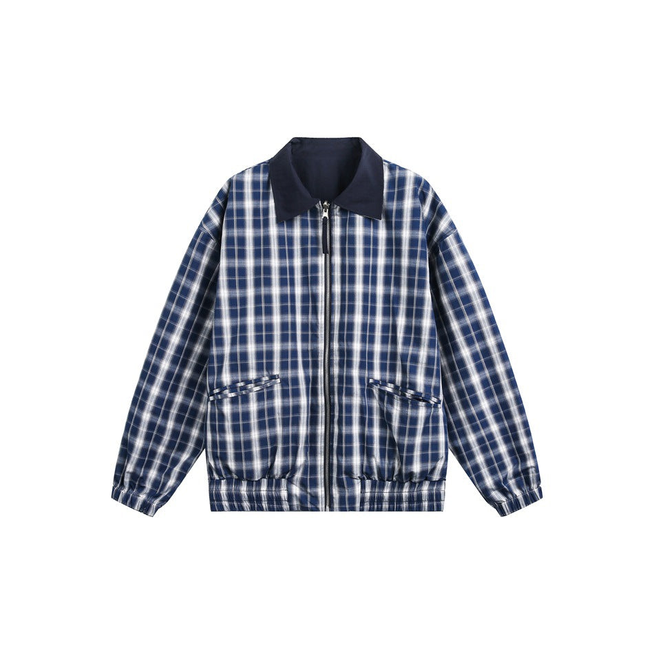 Front view of a blue-and-white plaid zip jacket with a dark pointed collar, flap pockets and elastic cuffs and hem.