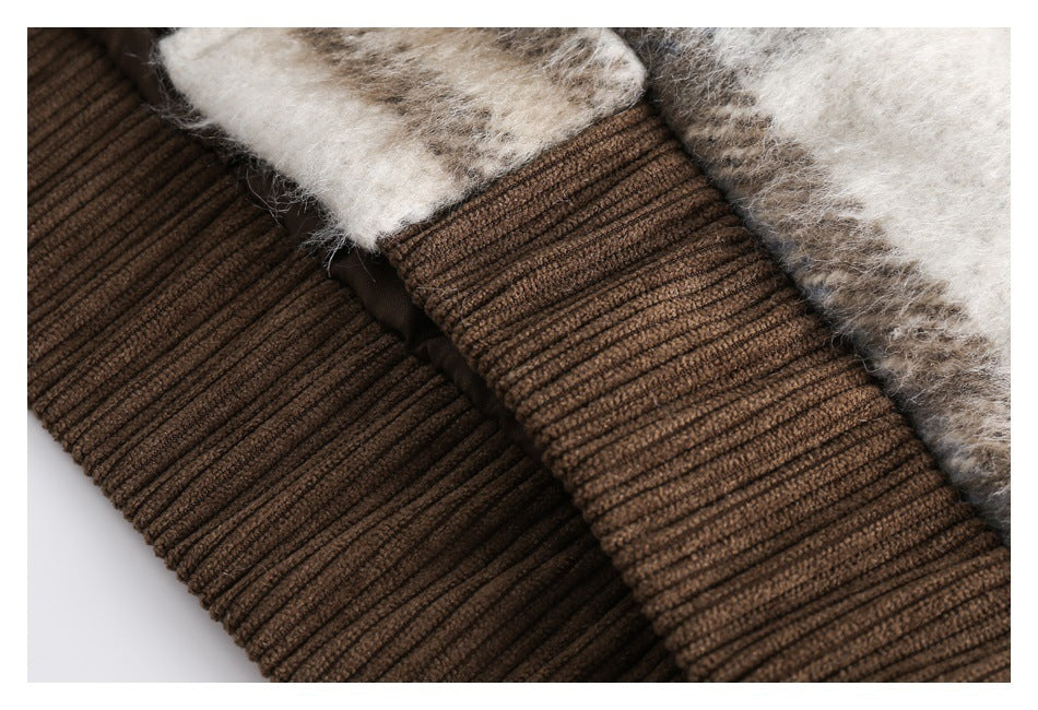 Close-up of the garment's brown ribbed cuff beside its fuzzy plaid fabric.